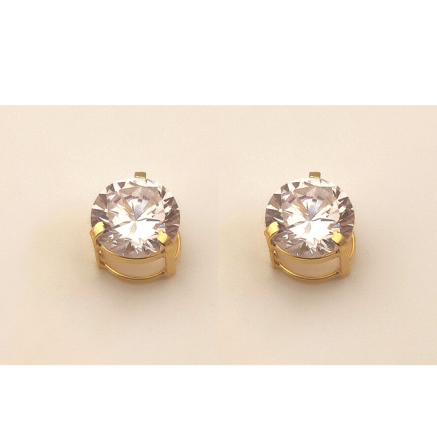 Brinco ponto de luz ouro 18 k com topázio 5 mm