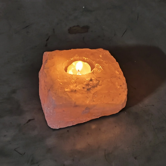 Porta velas de quartzo rosa bruto