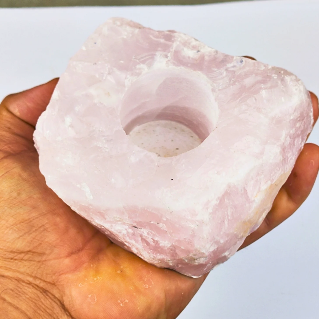 Porta velas de quartzo rosa bruto