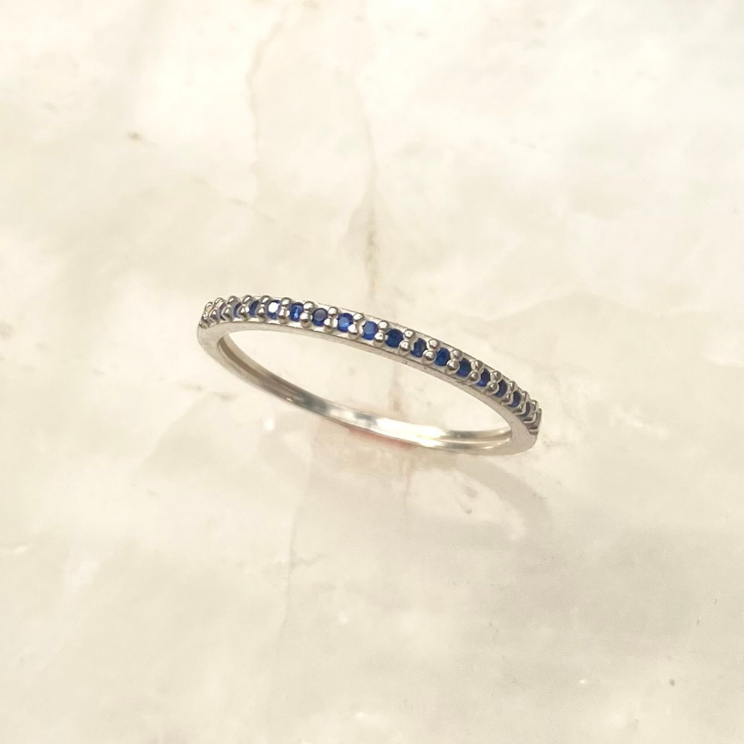 Anel Meia Aliança de Prata 950 com Zircônia Azul